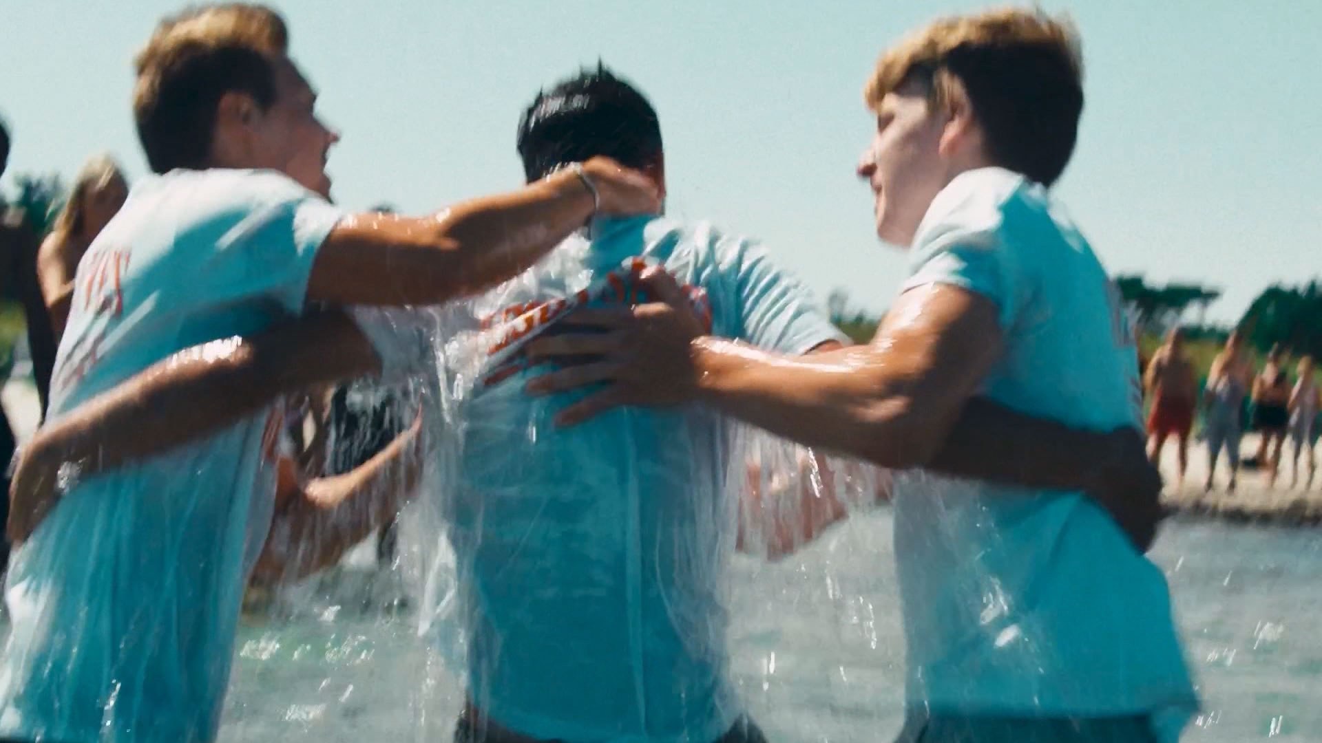 Young men after a lake baptism in Sweden, from CBN's report